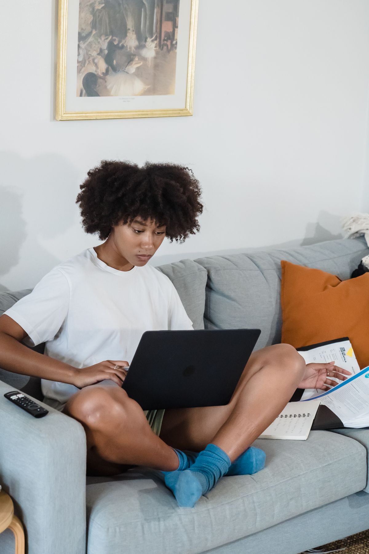 Independent travel agent working remotely on a laptop